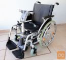 Invalidski voziček, s priklopnim električnim pogonom