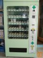 Prodajni Avtomat Magex Shop 24H Pharma na tračni sistem.